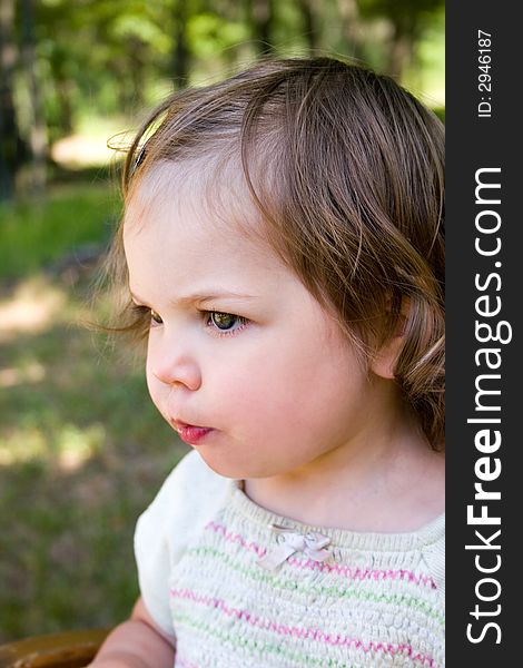 A little girl with a very serious look on her face. A little girl with a very serious look on her face