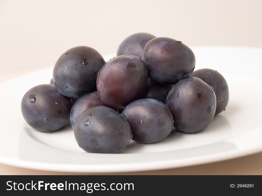Fresh Plums On The Plate
