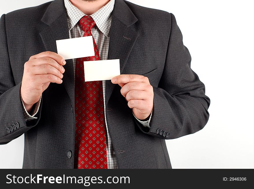 Businessman holding blank visiting cards. Businessman holding blank visiting cards