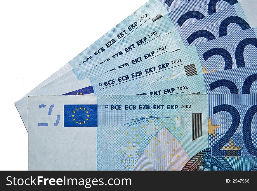 A fan of twenty euro banknotes on a white background. A fan of twenty euro banknotes on a white background