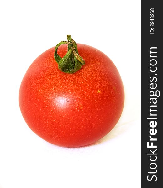 Red tomato isolated on the white background