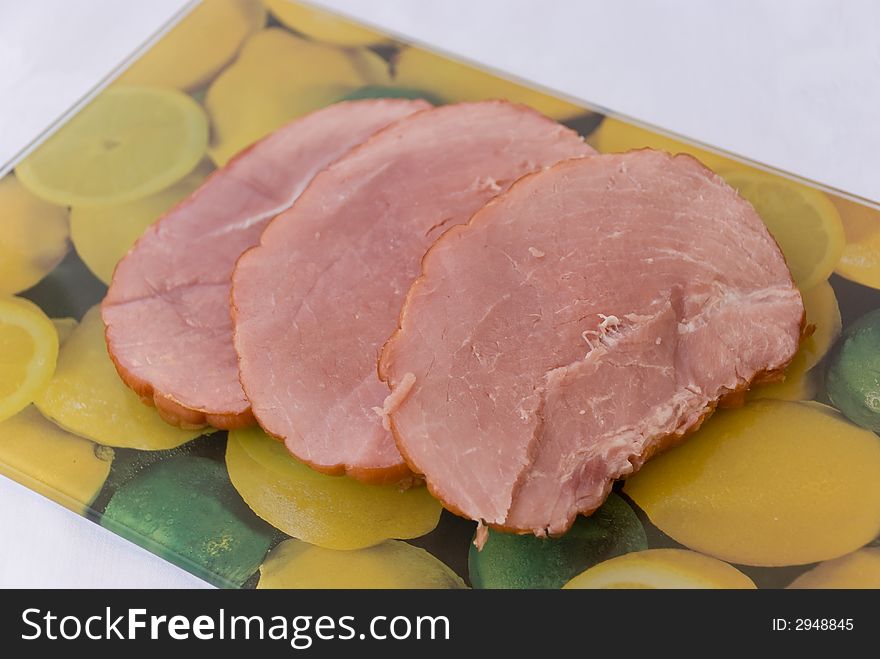 Fresh slices of marinated ham.