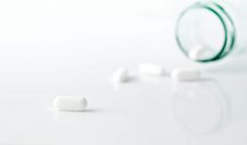 White Oval Pills Spilled Stock Photos White Oval Pills Spilled Stock Photos