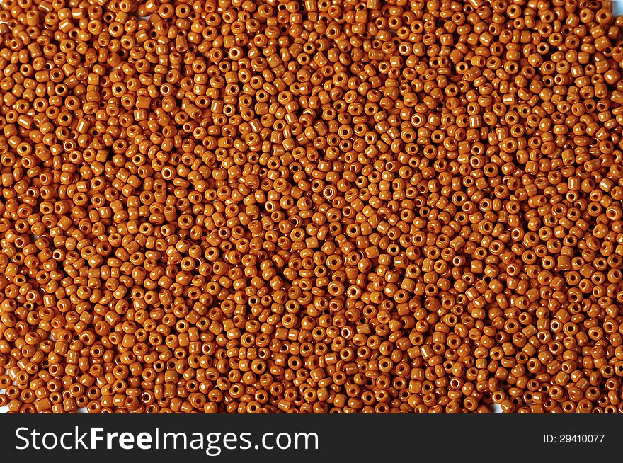 Texture of small orange beads ,suitable for backgrounds