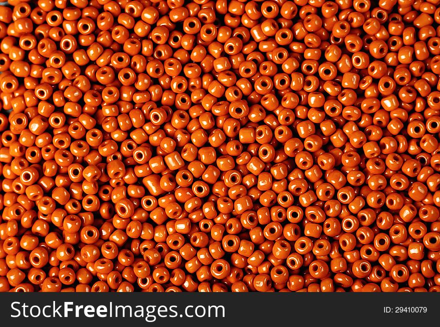 Texture of small orange beads ,suitable for backgrounds