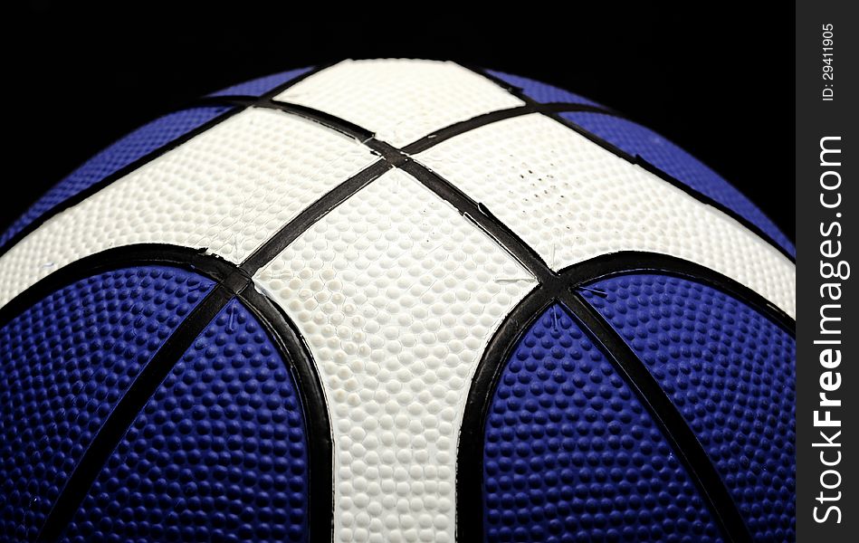 Closeup of white and blue basket ball