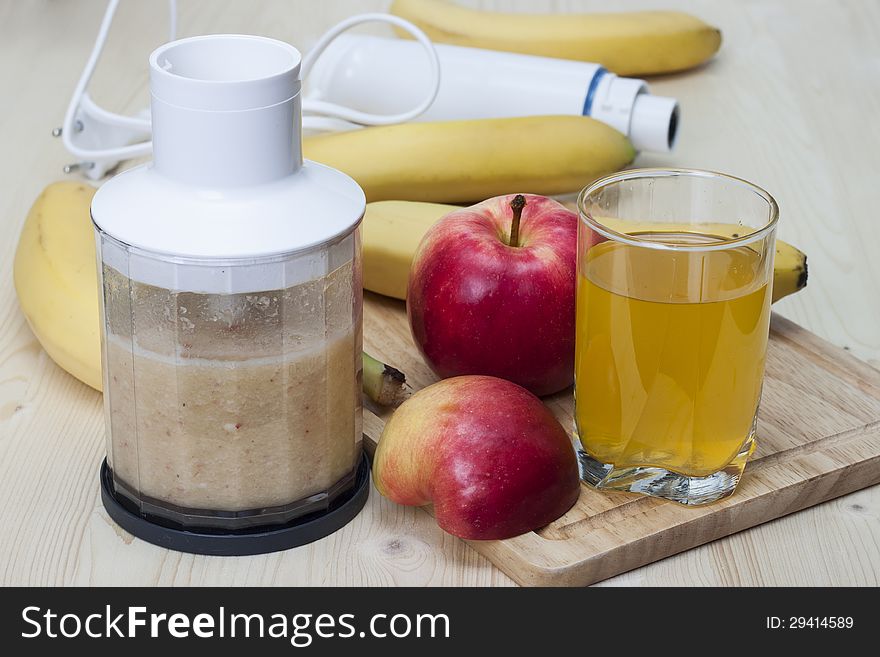 Cocktail of apple, banana and lemon in a cup. Cocktail of apple, banana and lemon in a cup.