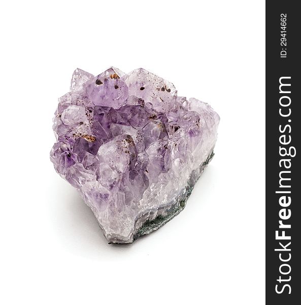 Amethyst stone on a white background .