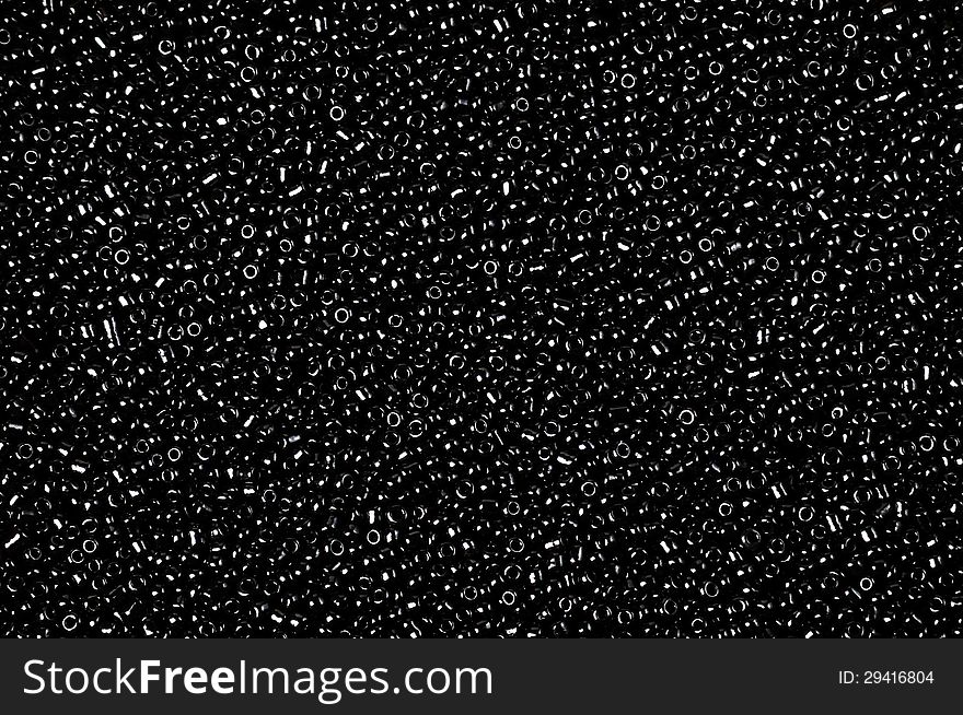 Texture of small  beads ,suitable for backgrounds. Texture of small  beads ,suitable for backgrounds