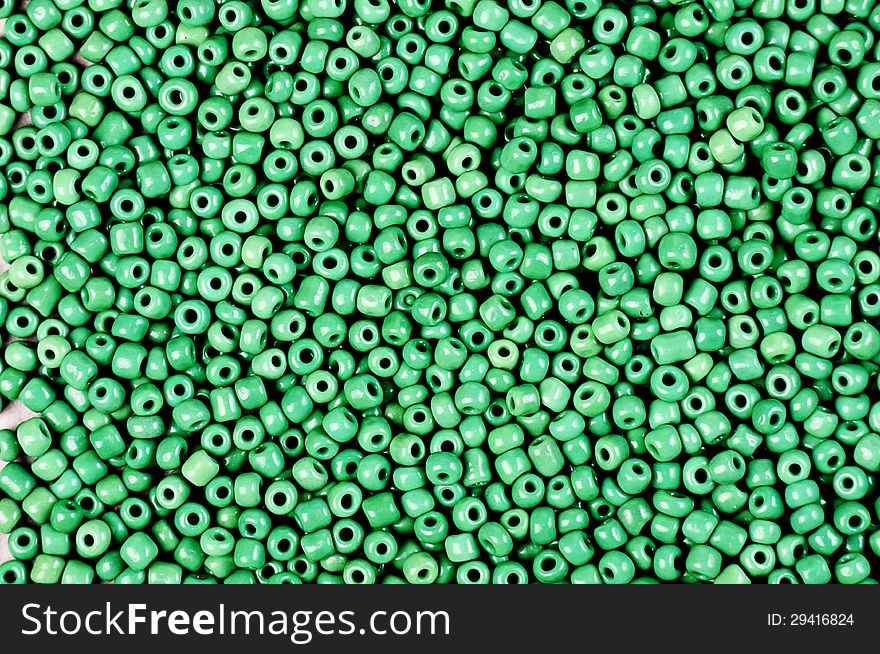 Texture of small green beads ,suitable for backgrounds. Texture of small green beads ,suitable for backgrounds