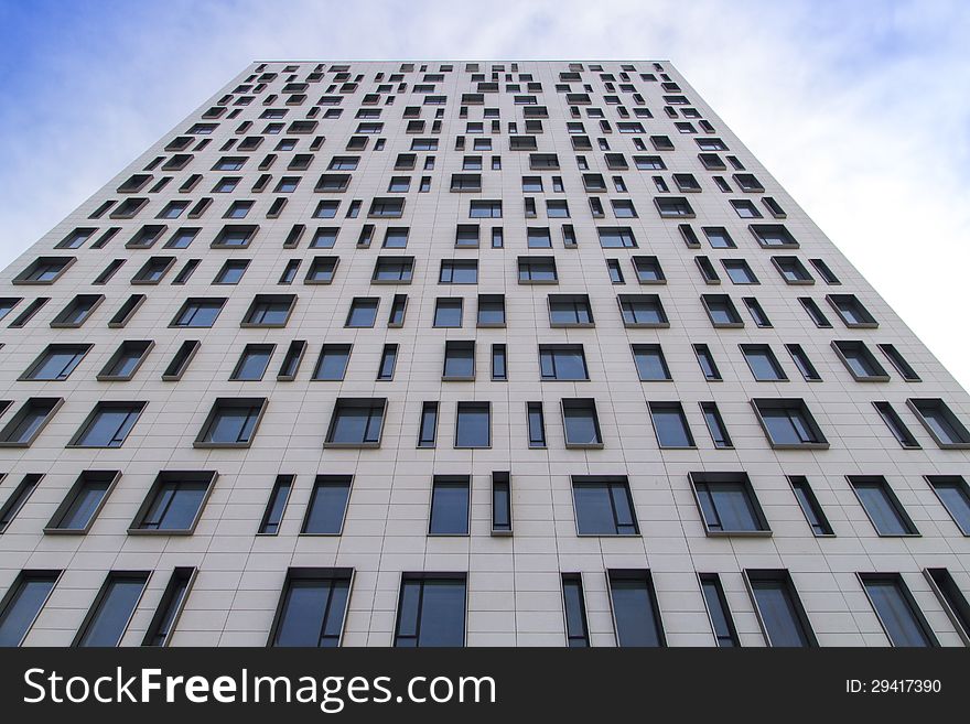 Tall building with blue skies. Tall building with blue skies