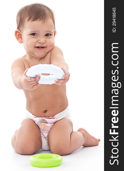 Funny girl with a toy isolated on a white background. Funny girl with a toy isolated on a white background.