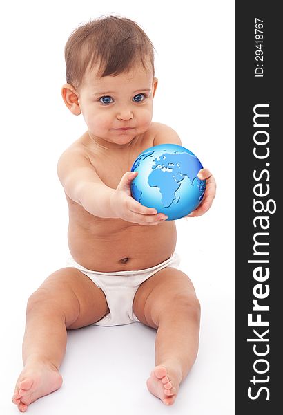 Baby sits at the floor with globe in her hand. Isolated on a white background. Baby sits at the floor with globe in her hand. Isolated on a white background.