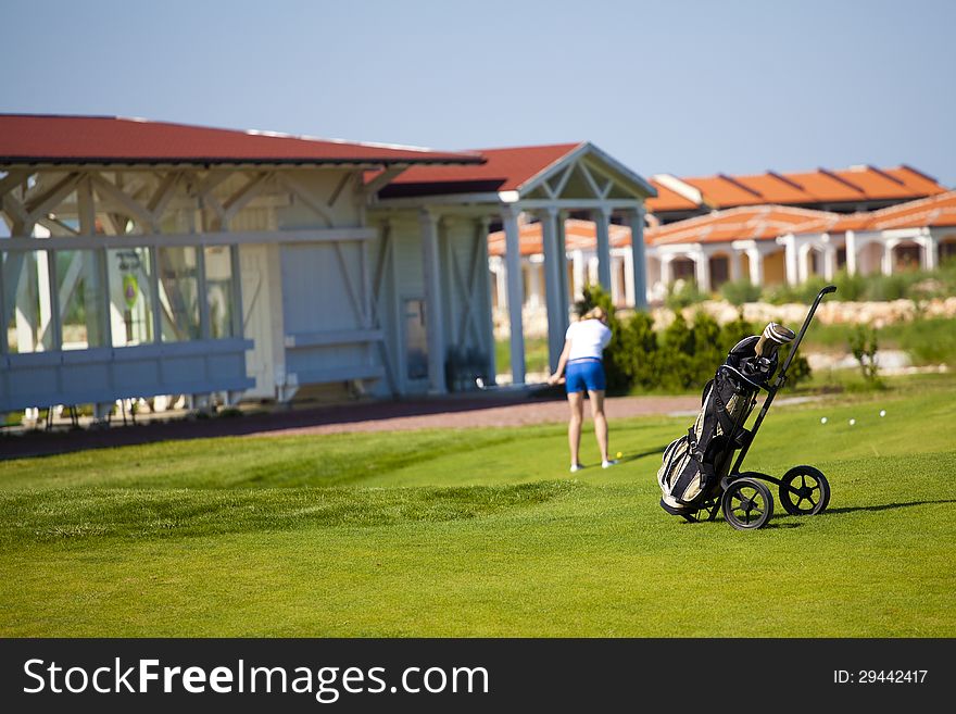 Golf Bag. Woman Playing