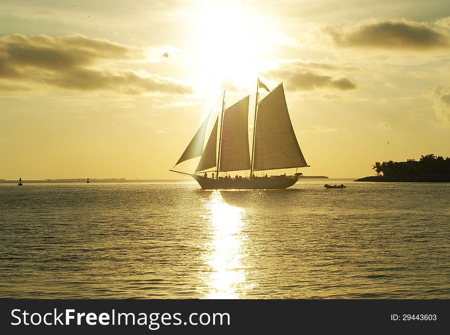 Sailboat against a beautiful sunset in key west, florida. Sailboat against a beautiful sunset in key west, florida