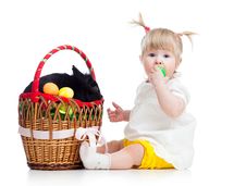 Funny Baby Girl With Easter Bunny In Basket Stock Photo