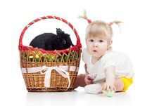 Funny Baby Girl With Easter Bunny In Basket Stock Photo