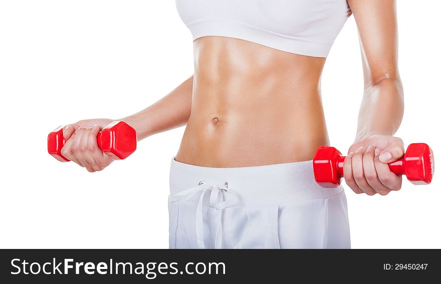 Torso of a young fit woman lifting dumbbells isolated on white background. Torso of a young fit woman lifting dumbbells isolated on white background