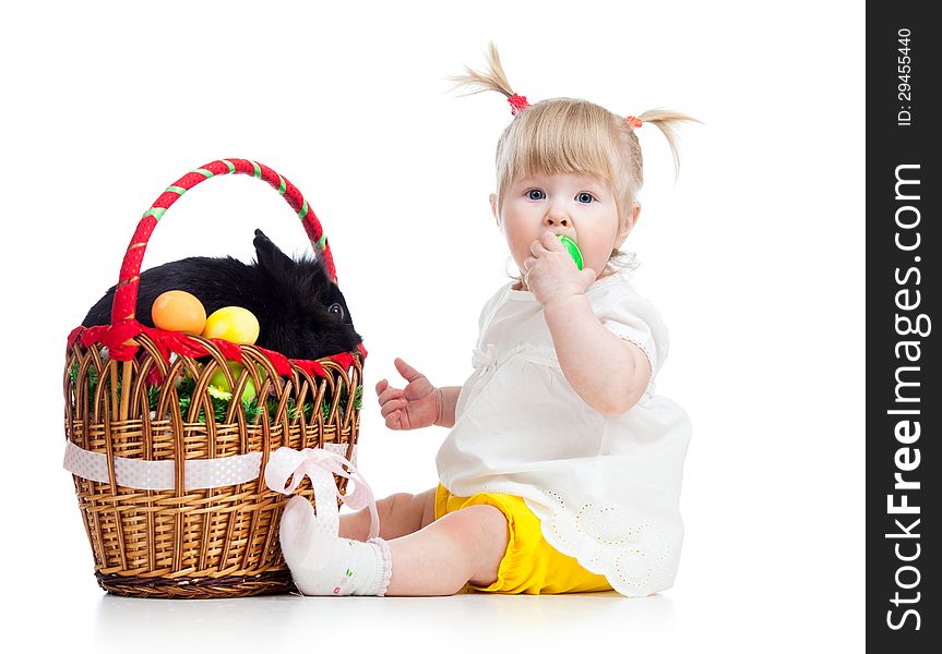 Funny kid girl with Easter bunny in basket. Funny kid girl with Easter bunny in basket