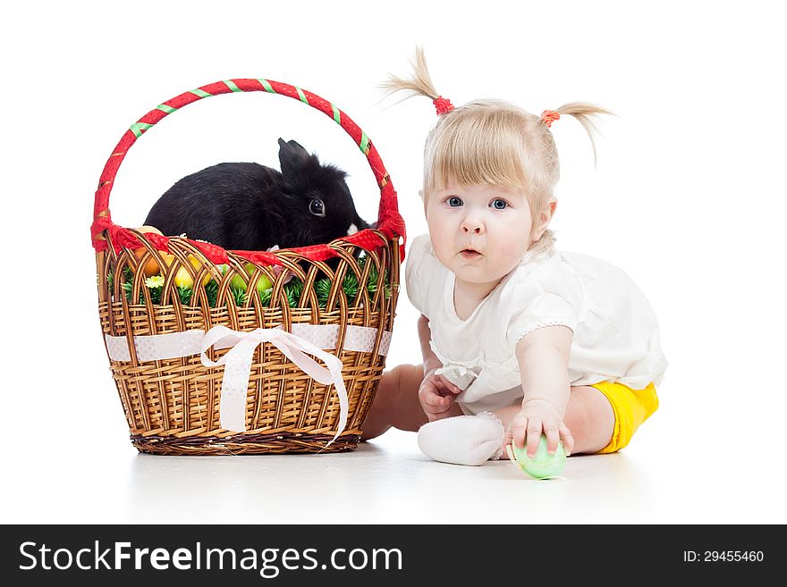 Funny baby girl with Easter rabbit in basket. Funny baby girl with Easter rabbit in basket