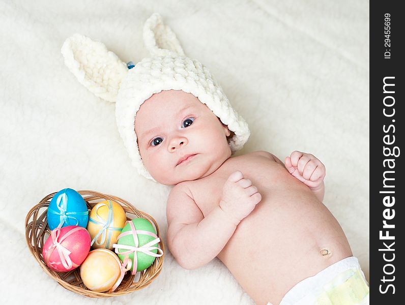 Baby girl dressed in Easter bunny cap
