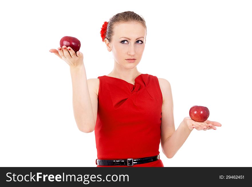 The girl in red dress holding a Apple isolated on white background