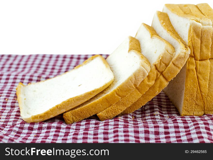 Wheaten Bread Sliced, On The Plaid Fabric