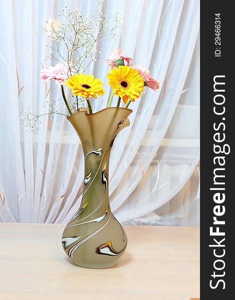 Yellow Flowers In A Beautiful Original Vase.