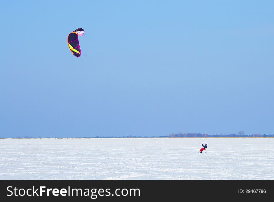 Winter Snowkiting on the ice lake