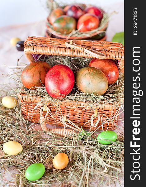 Easter eggs decoration in a woven basket