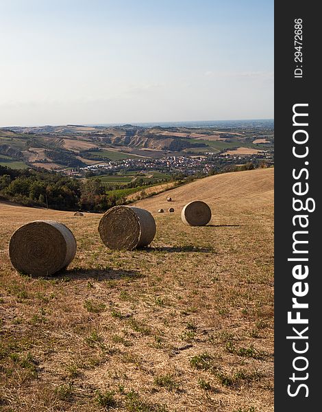 Romagna countryside with bales of hay