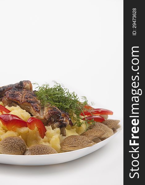 Grilled fresh meat with mash potato, mashrooms and vegetables. national belarussian food. Grilled fresh meat with mash potato, mashrooms and vegetables. national belarussian food