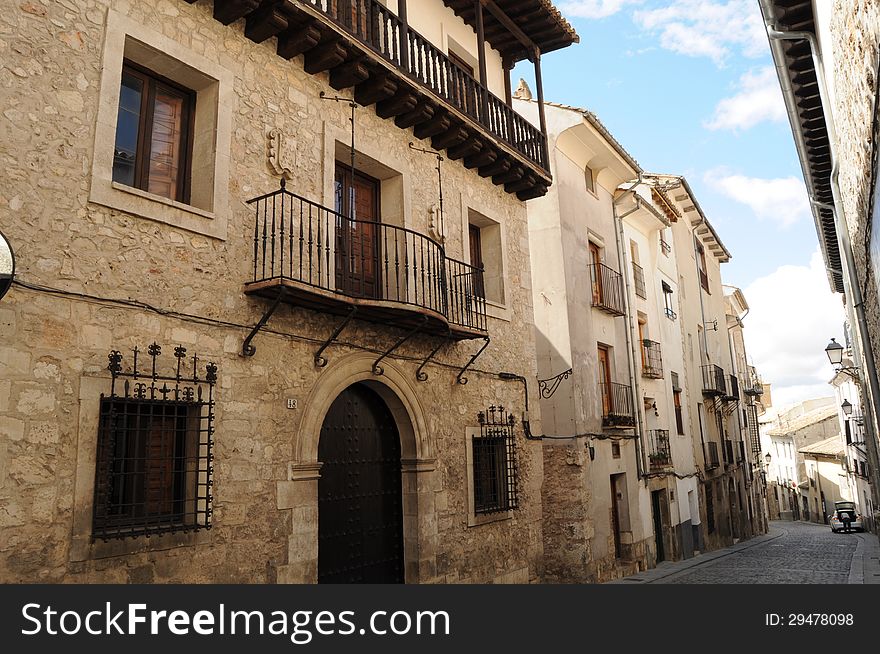 Cuenca street with a stony houses