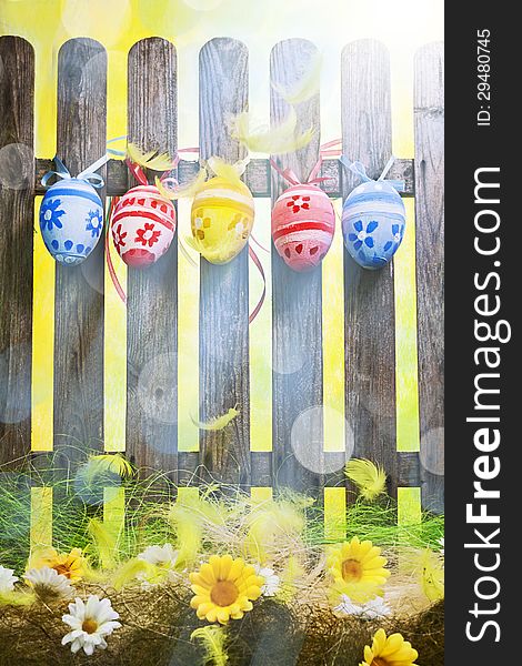 Art easter background with eggs on fence for design or greating card. Art easter background with eggs on fence for design or greating card