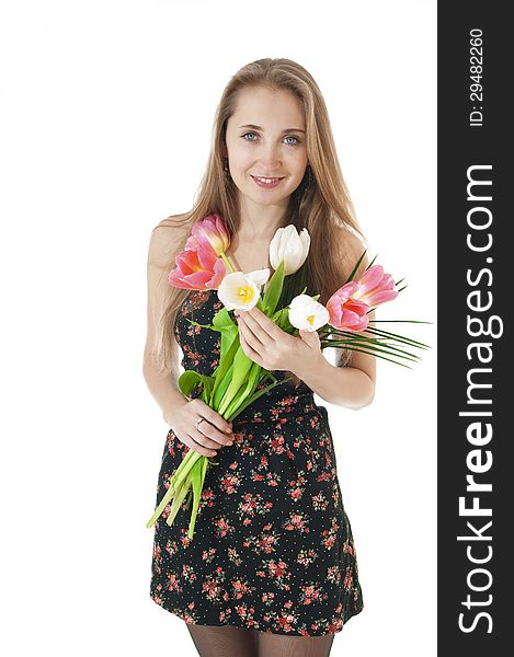 Portrait of a happy smiling girl with a bouquet of spring tulips in hands on a white background! Women day concept/8 March. Portrait of a happy smiling girl with a bouquet of spring tulips in hands on a white background! Women day concept/8 March.