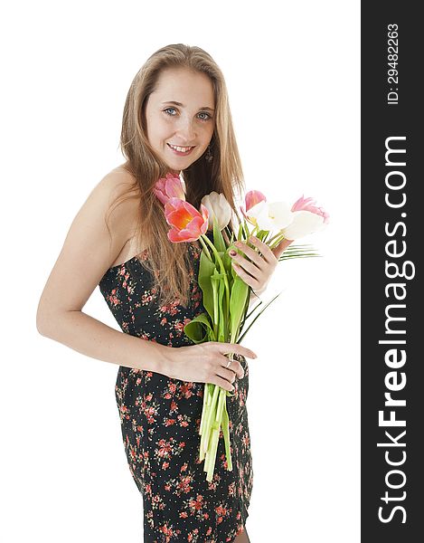 Portrait of a happy smiling girl with a bouquet of spring tulips in hands on a white background! Women day concept/8 March. Portrait of a happy smiling girl with a bouquet of spring tulips in hands on a white background! Women day concept/8 March.