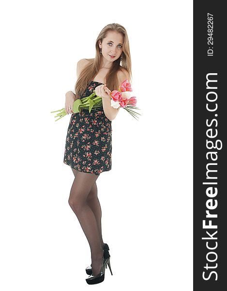 Portrait of a happy smiling girl with a bouquet of spring tulips in hands on a white background! Women day concept/8 March. Portrait of a happy smiling girl with a bouquet of spring tulips in hands on a white background! Women day concept/8 March.