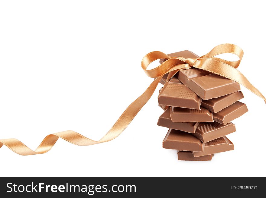 Chocolate blocks present isolated on white. See my other works in portfolio.