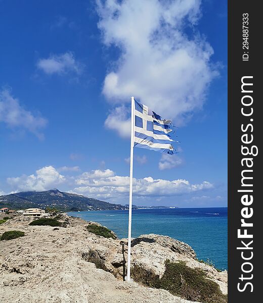 Greece Flag at the northern point of Island Zakynthos, Greece