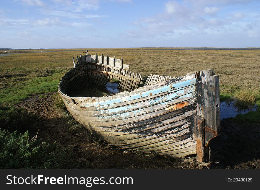 Old crab boat abandoned on Blakeny Marshes. Old crab boat abandoned on Blakeny Marshes