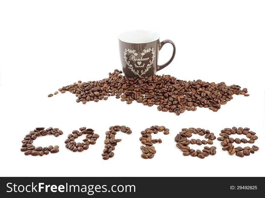 Pile of coffee beans with a coffee cup. Pile of coffee beans with a coffee cup