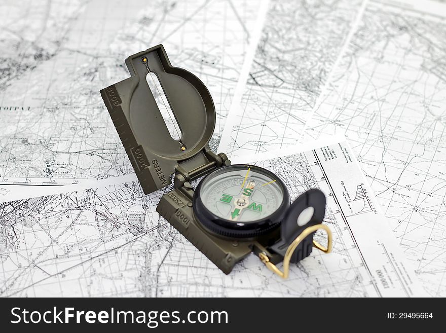 Compass on the background maps