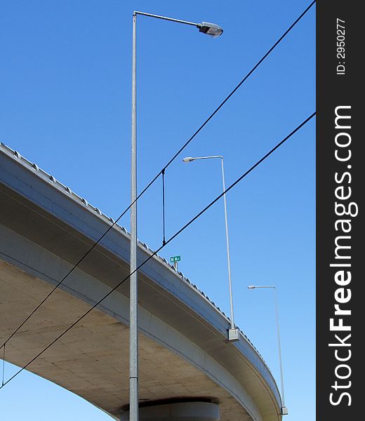 Round highway with street lights overhead