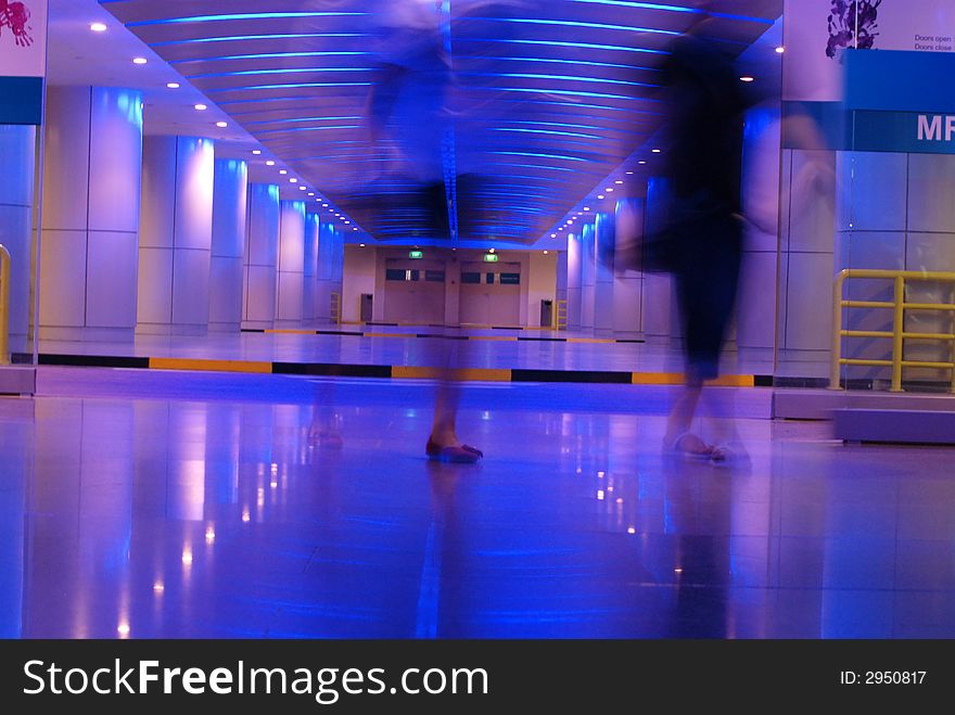 People walking in the basement car park