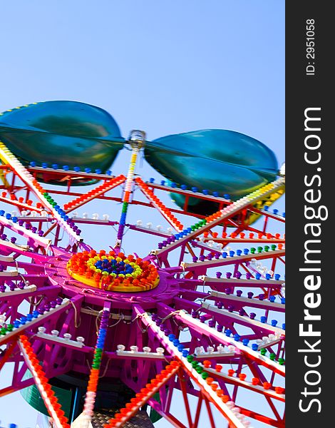 Detail of a carousel in a amusement park. Detail of a carousel in a amusement park.