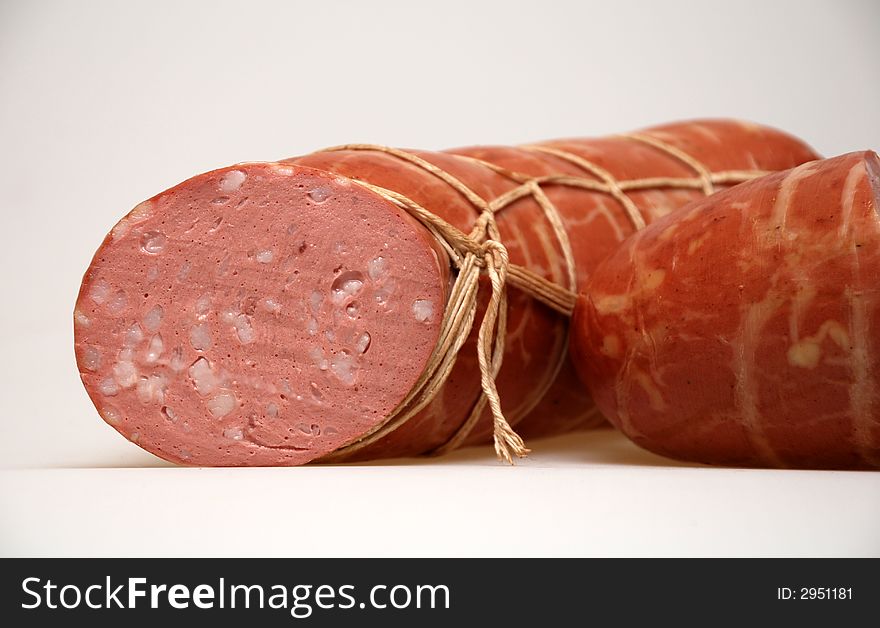Boiled sausage on white background