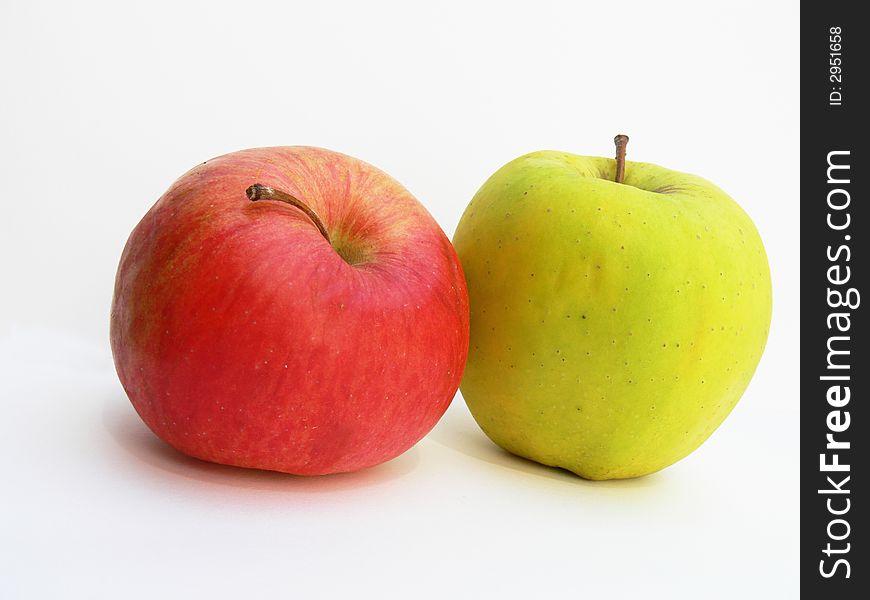 Two apples on the white background. Two apples on the white background.