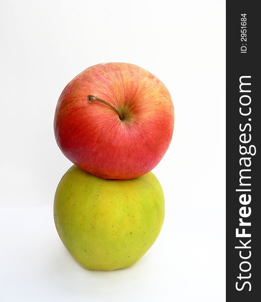 Two apples on the white background. Two apples on the white background.