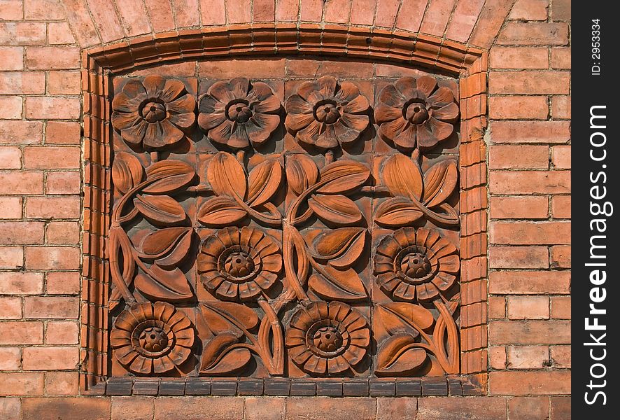 Attractive floral tiled plaque blocking up an old window