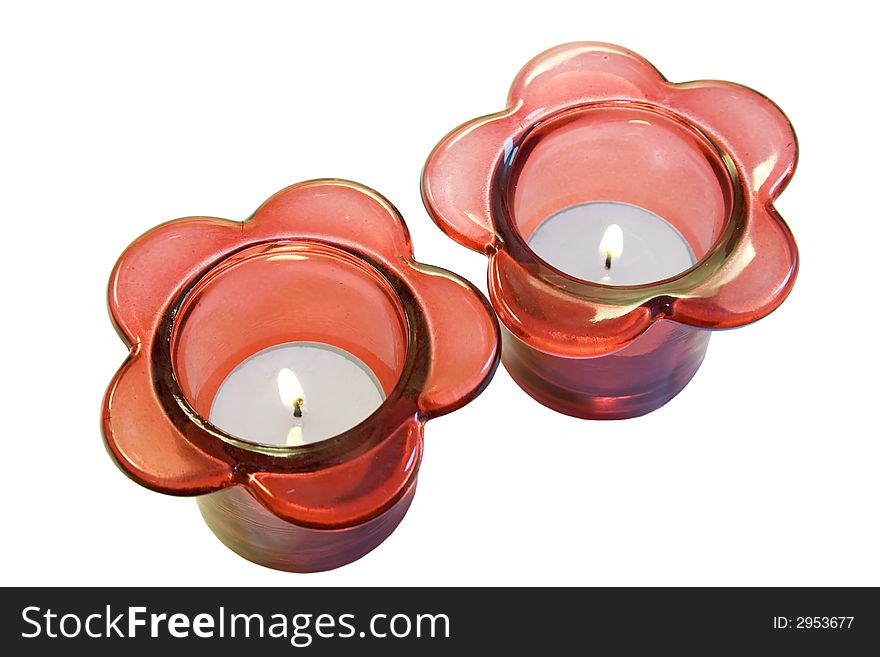 Red candle holders isolated on white.